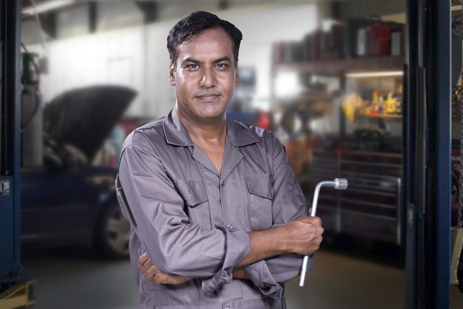 Friendly auto mechanic ready to assist with windshield replacement